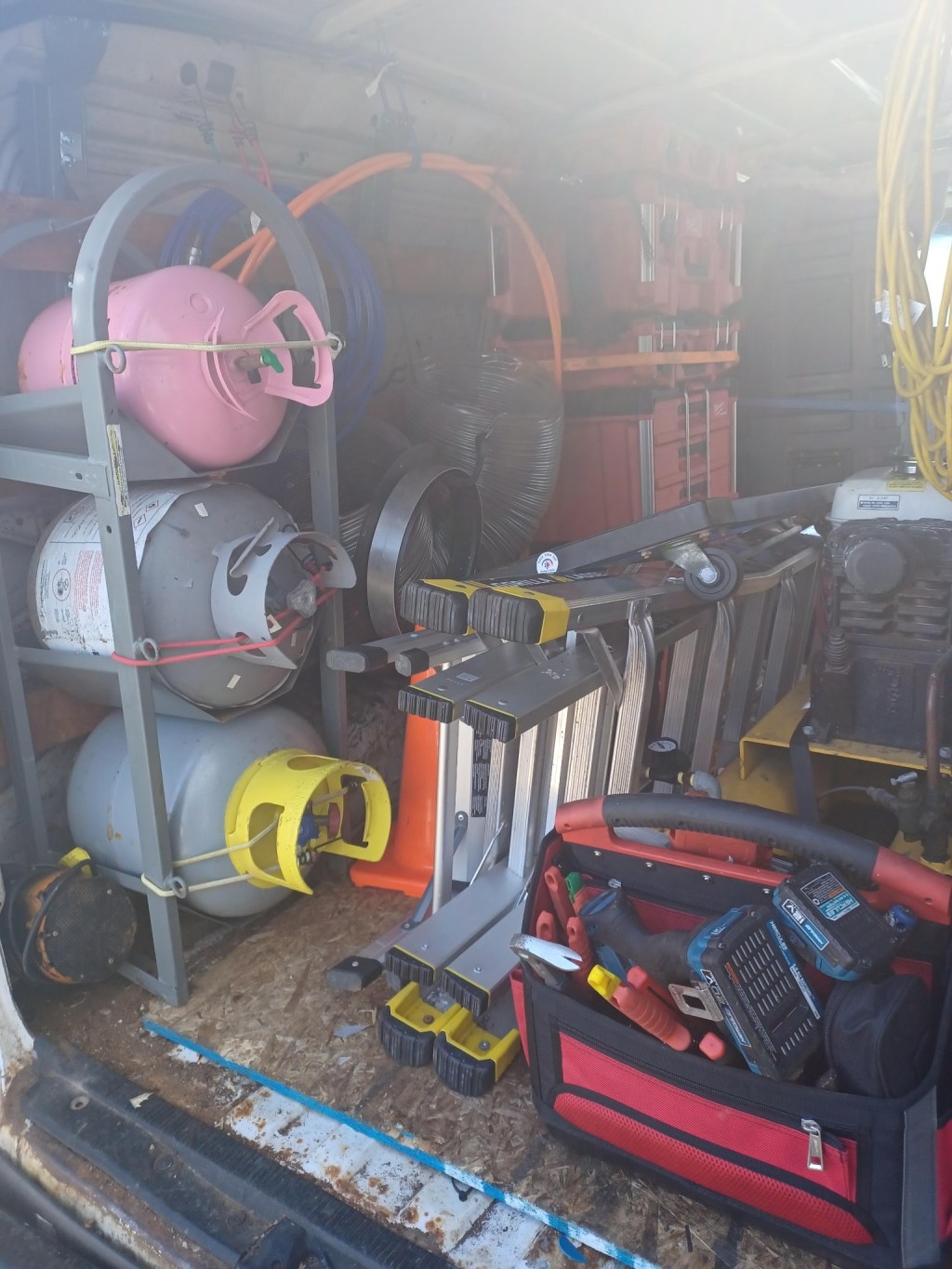Organized HVAC cleaning and service equipment inside a Ross Tech 360 service van