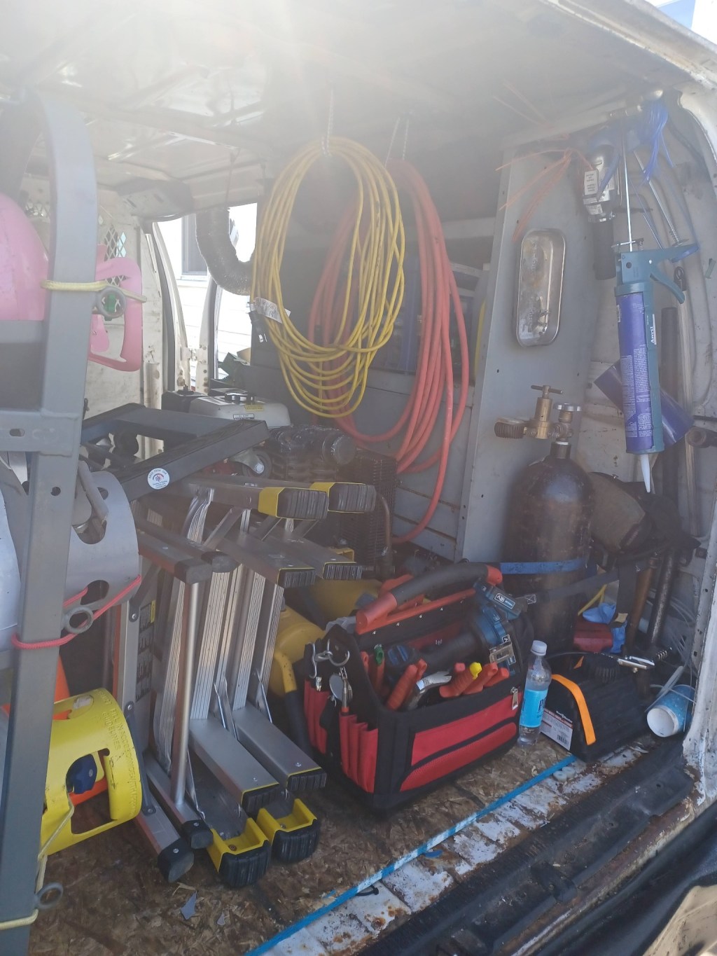 HVAC tools, hoses and service equipment organized inside the Ross Tech 360 van